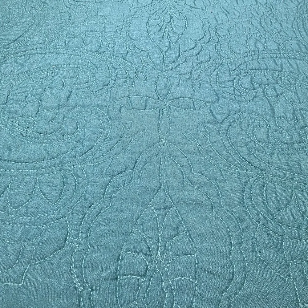 American Pacific teal quilted